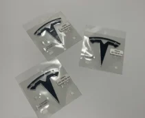 ОРИГІНАЛ TESLA - Значок на капот 1694511-00-C