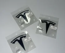 ОРИГІНАЛ TESLA - Значок на капот 1694511-00-C