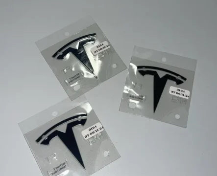 ОРИГІНАЛ TESLA - Значок на капот 1694511-00-C