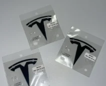 ОРИГІНАЛ TESLA - Значок на капот 1694511-00-C